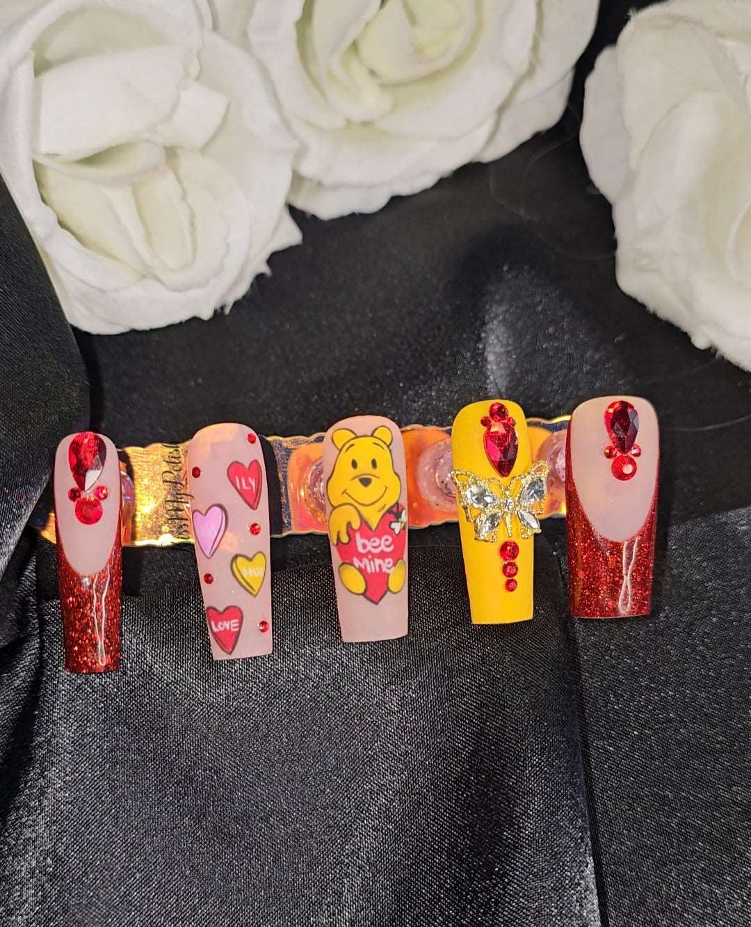 Get trendy with Pooh Love - press on nails available at Kiss My Polish.