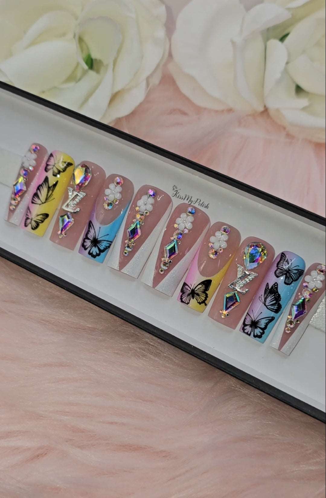 Get trendy with Pastel Butterfly 🦋 - press on nails available at Kiss My Polish.