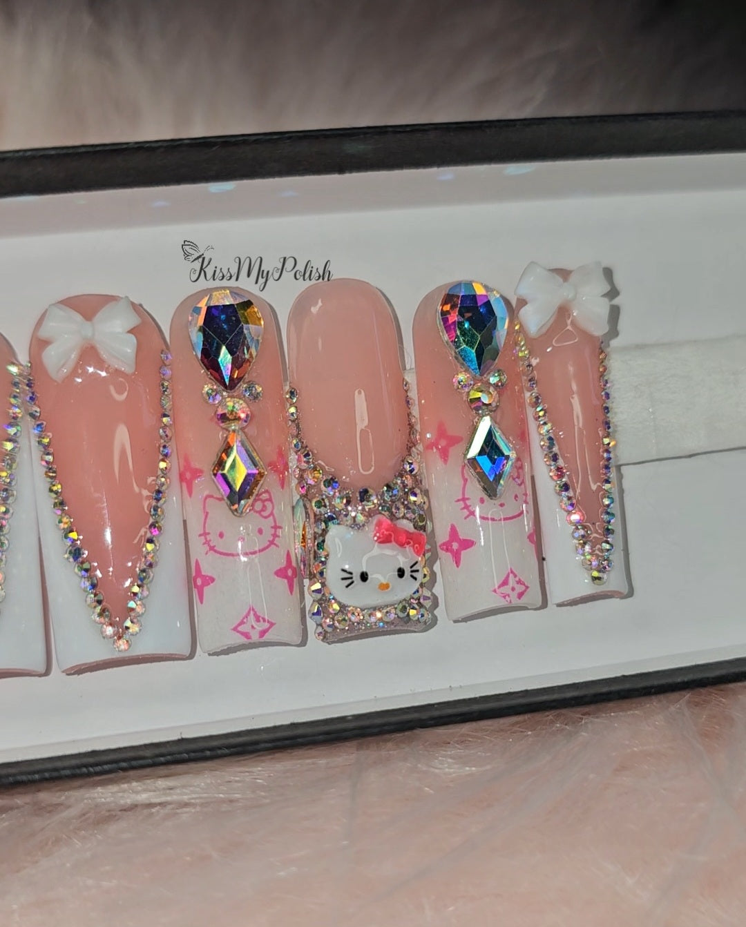 Get trendy with Kitty - press on nails available at Kiss My Polish.