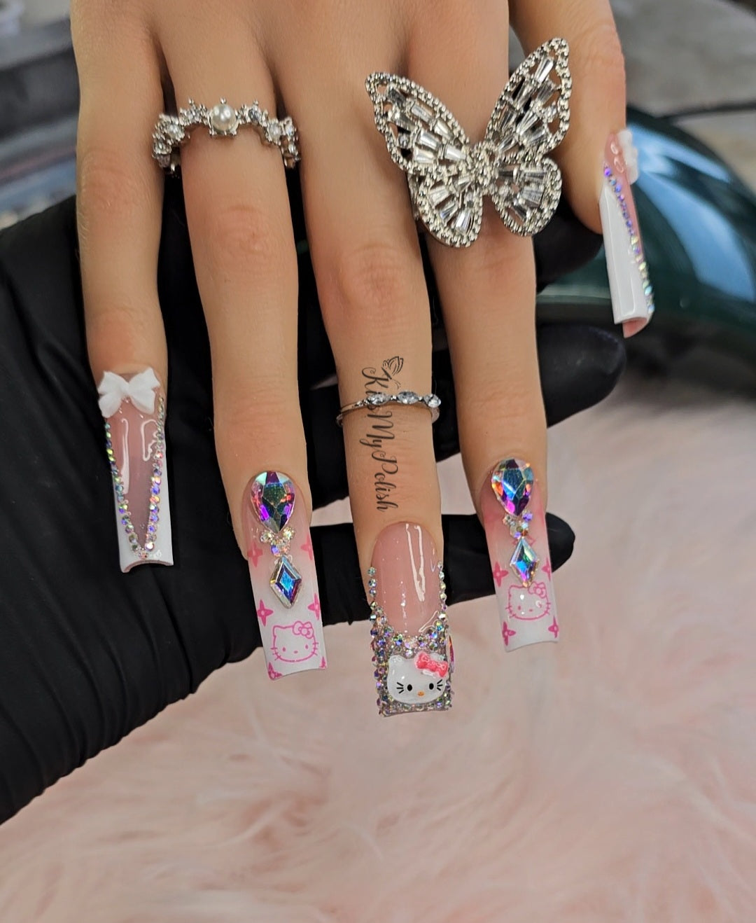 Get trendy with Kitty - press on nails available at Kiss My Polish.