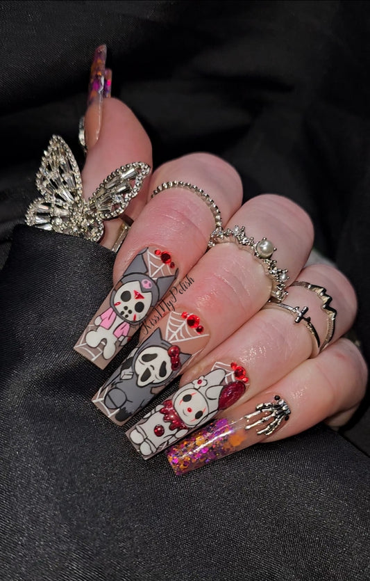 Get trendy with Halloween Sanrio - press on nails available at Kiss My Polish.