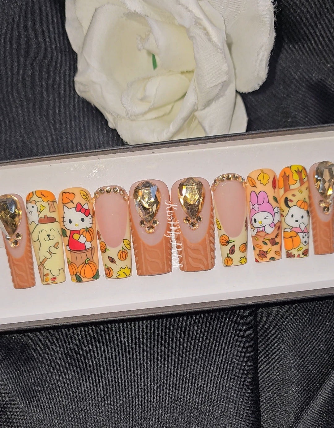 Get trendy with Sanrio Fall - press on nails available at Kiss My Polish.