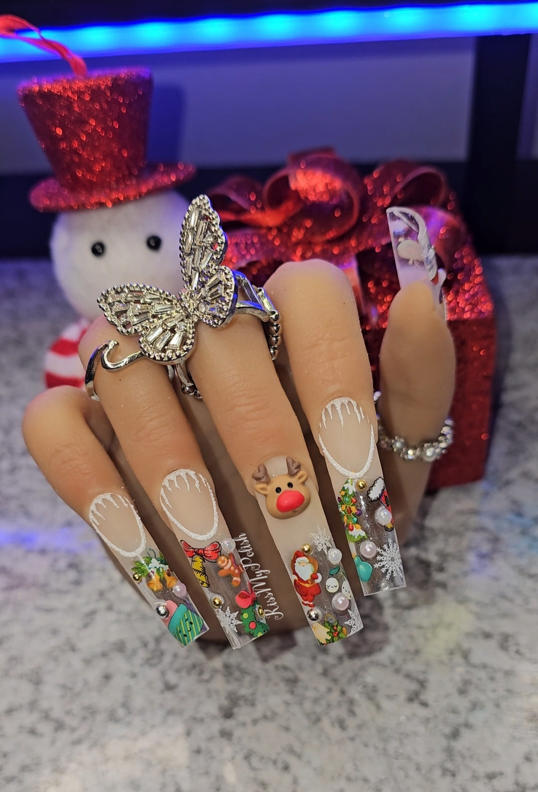 Get trendy with Christmas Fun - press on nails available at Kiss My Polish.