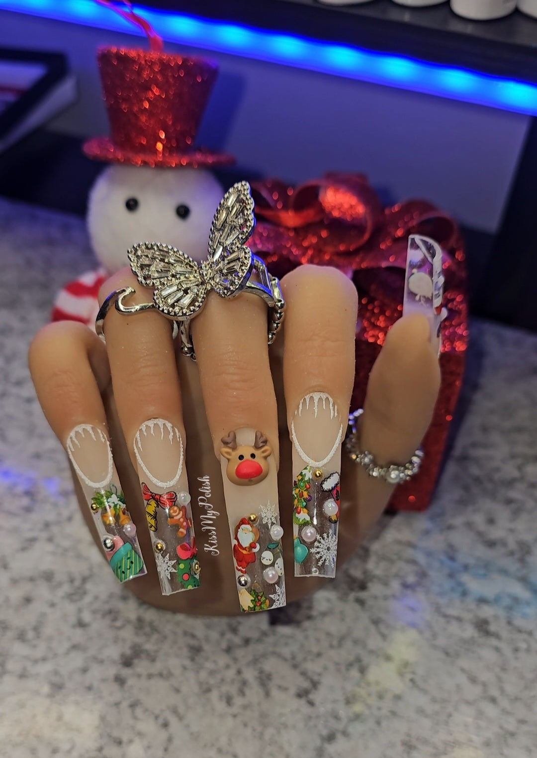 Get trendy with Christmas Fun - press on nails available at Kiss My Polish.