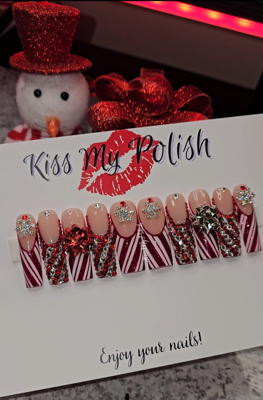 Get trendy with Candy Cane Glam - press on nails available at Kiss My Polish.