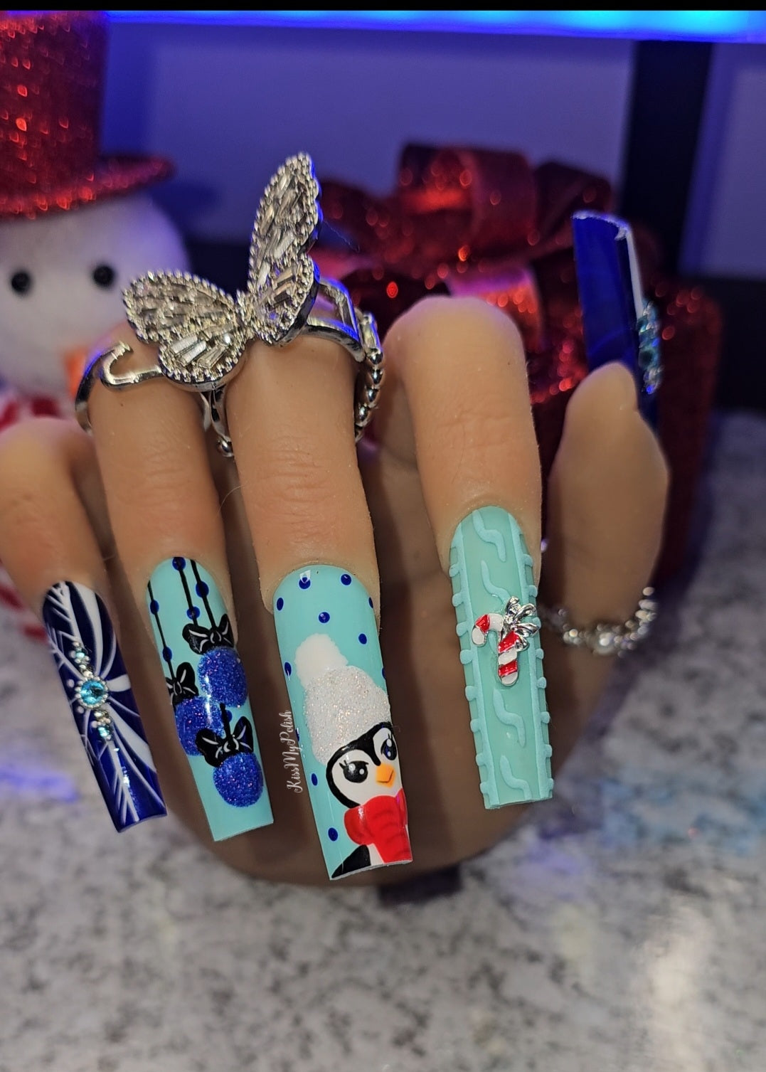 Get trendy with Cozy Penguin - press on nails available at Kiss My Polish.