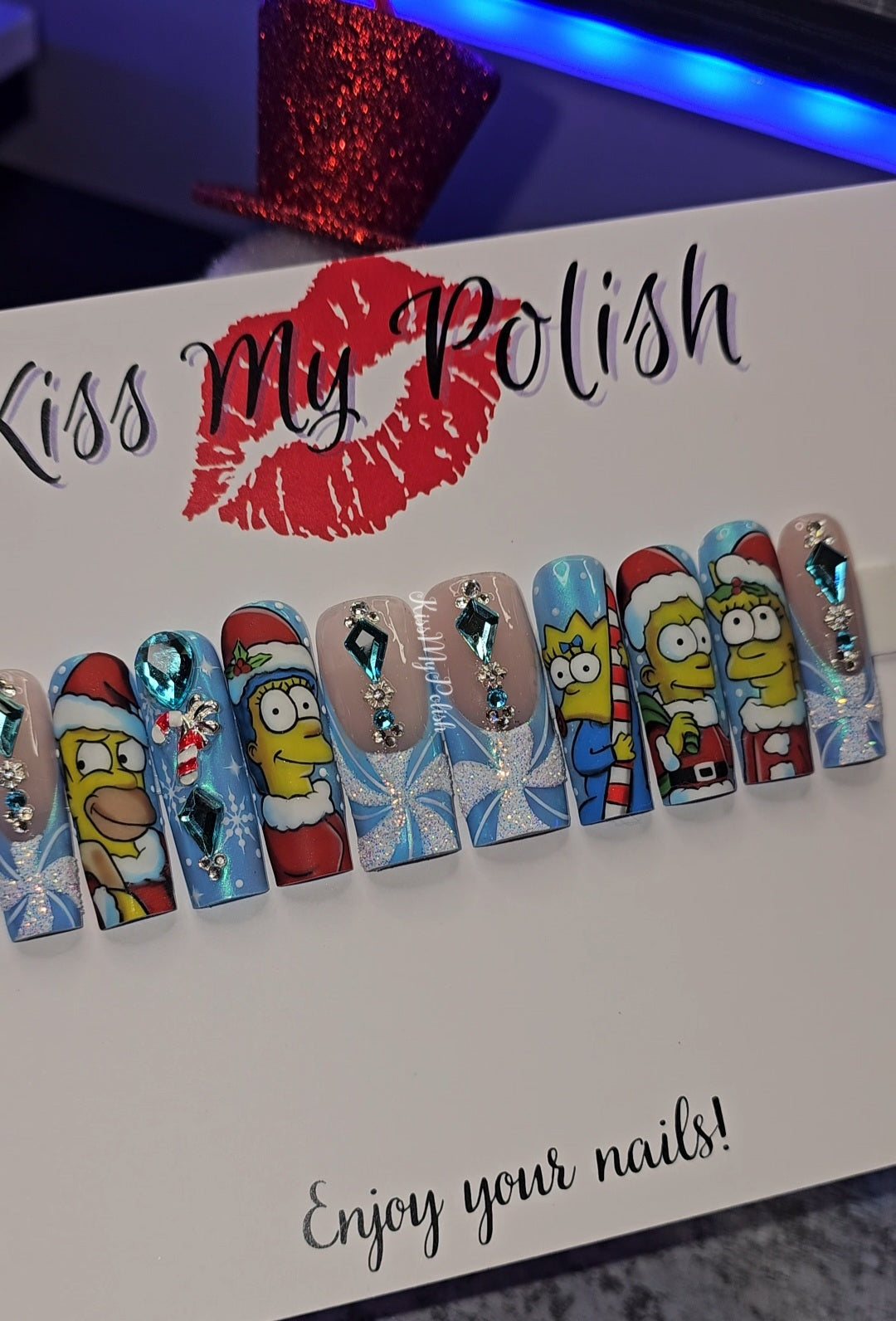 Get trendy with Simpsons Christmas - press on nails available at Kiss My Polish.