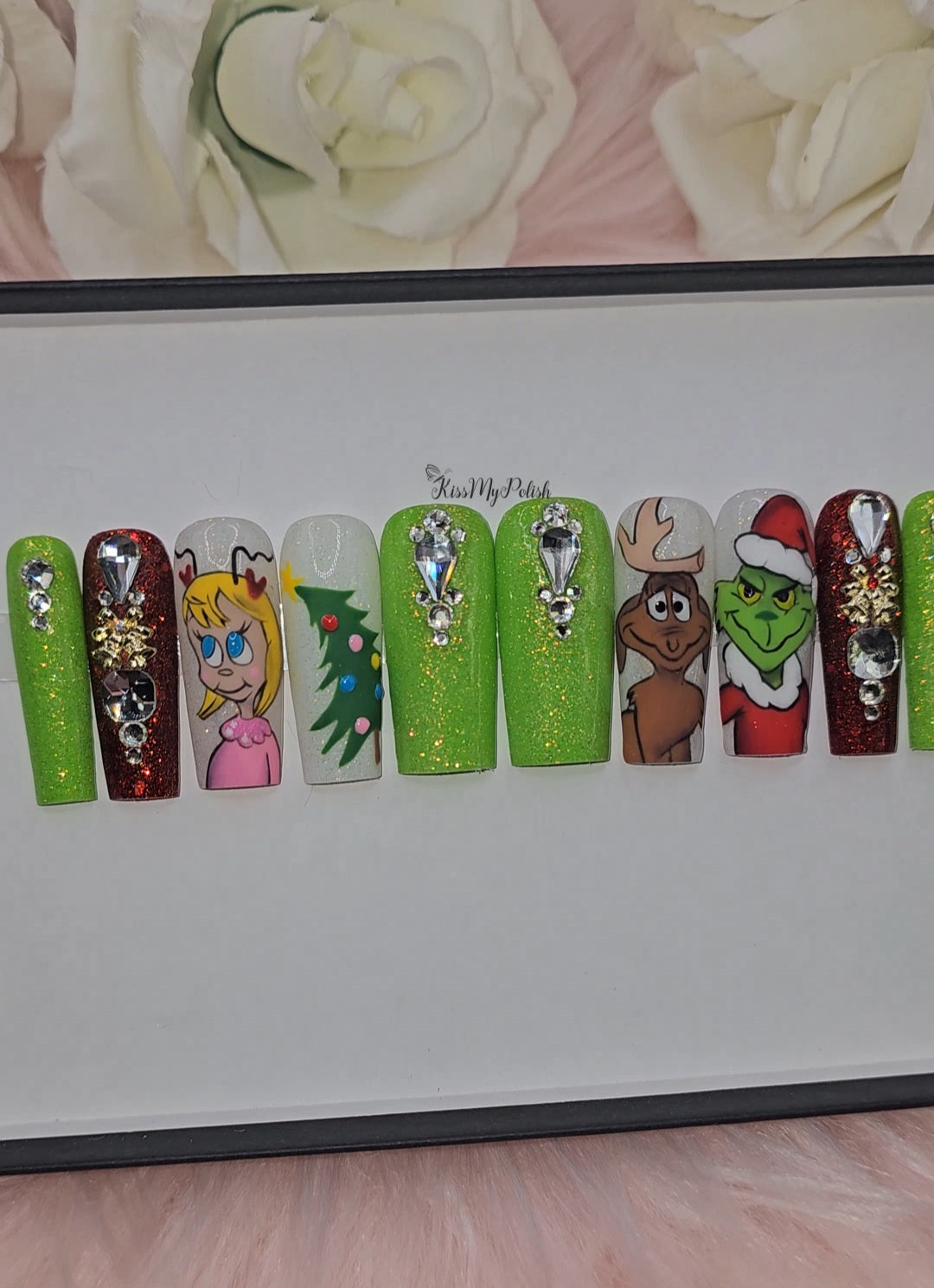 Get trendy with Grinch - press on nails available at Kiss My Polish.