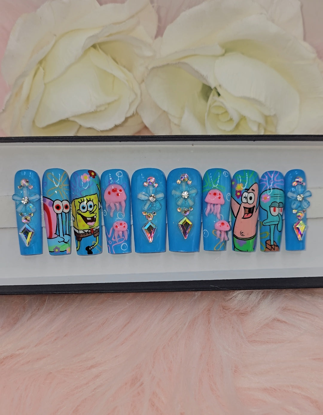 Get trendy with Spring Cartoon - press on nails available at Kiss My Polish.