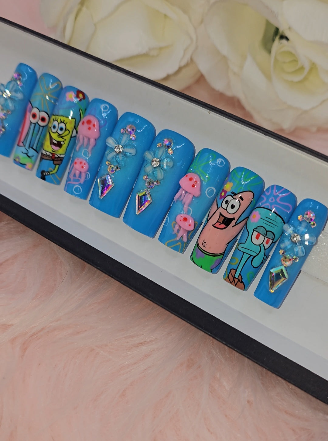 Get trendy with Spring Cartoon - press on nails available at Kiss My Polish.