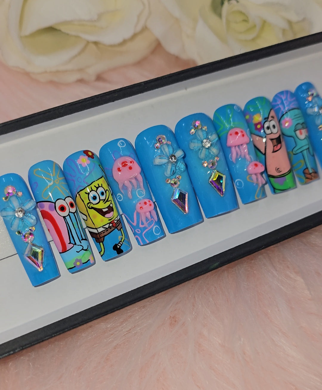 Get trendy with Spring Cartoon - press on nails available at Kiss My Polish.