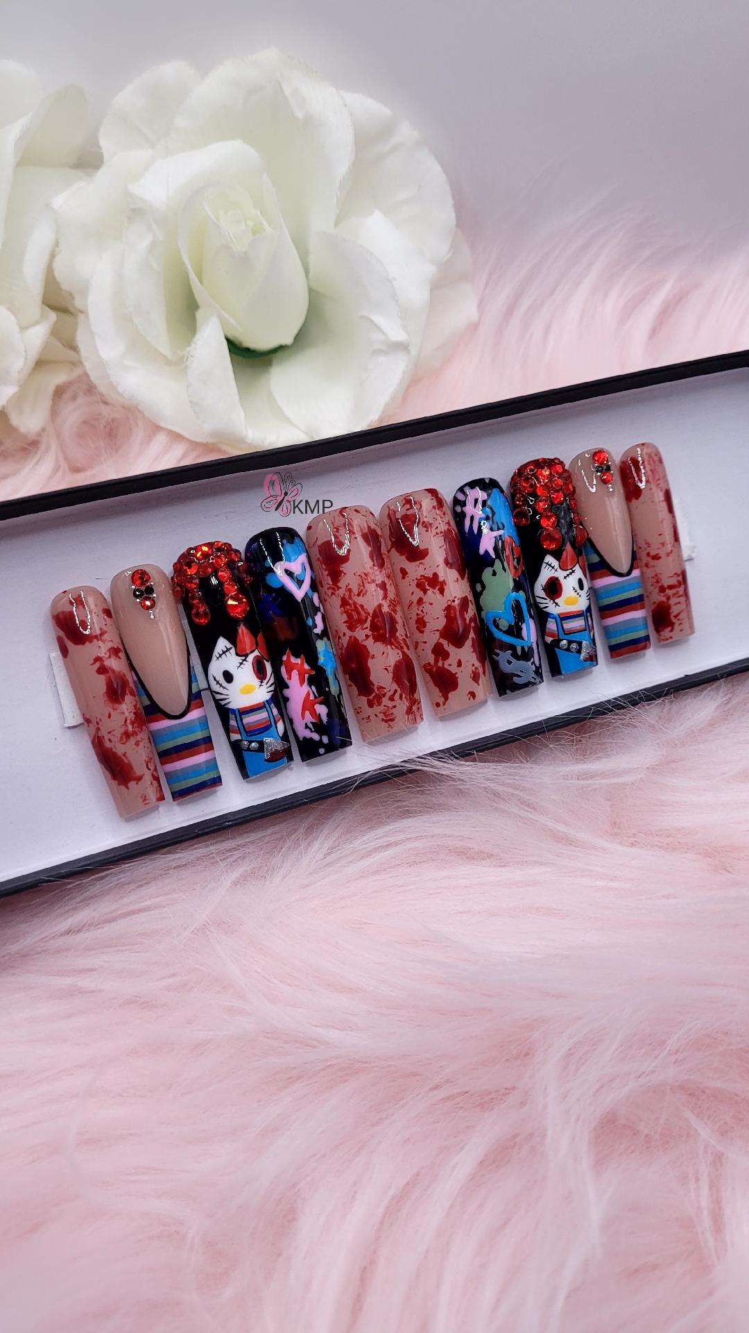 Get trendy with HK Horror - press on nails available at Kiss My Polish.