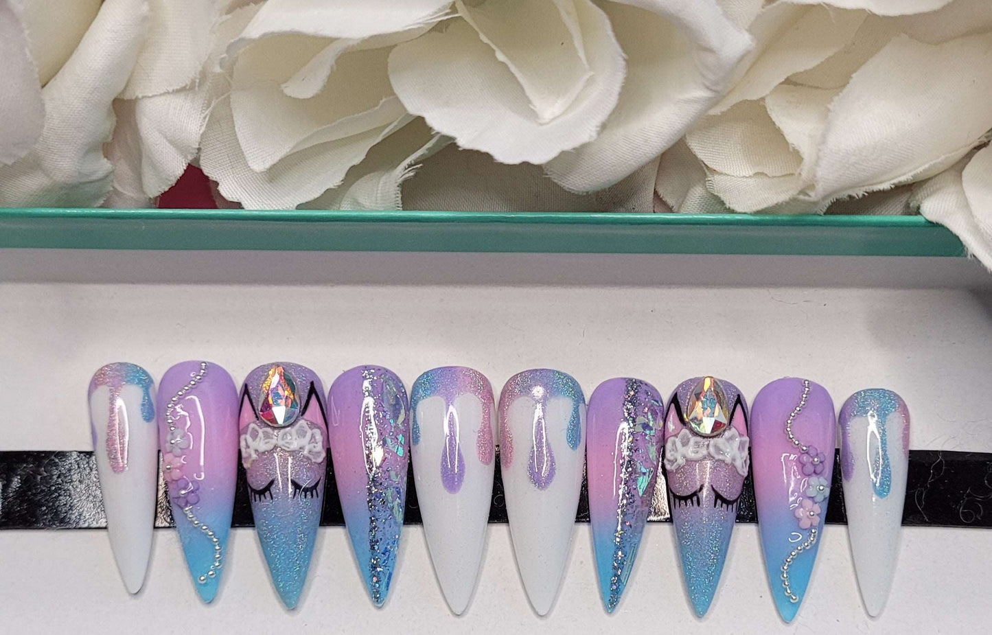 Get trendy with Unicorn - press on nails available at Kiss My Polish.