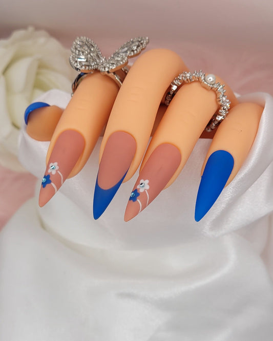 Get trendy with Blue Daisy - press on nails available at Kiss My Polish.